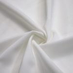 Soft white fabric material used for custom clothing uniforms, smooth texture, high-quality textile, ideal for professional workwear, manufactured by Sha China.