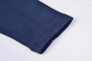High-quality navy blue workwear fabric with durable stitching, perfect for custom uniforms and industrial clothing.