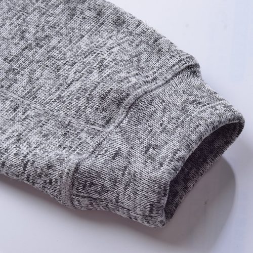 Soft grey blend hoodie cuff showing textured knit fabric for custom garment comfort and durability.