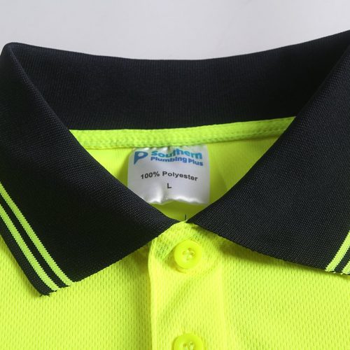 High-visibility fluorescent yellow work polo shirt with black collar and stripe accents, made from durable 100% polyester fabric, perfect for safety and professional uniforms.