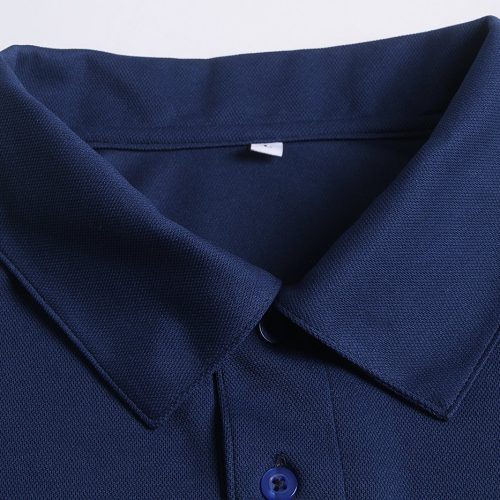 High-quality navy blue work uniform shirt with neon green accents, tailored for durability and comfort, suitable for various industrial workplaces.