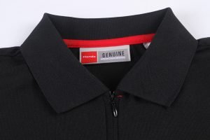 Black custom polo shirt with a polyester blend, featuring a zipper collar, made for branding and uniform purposes. High-quality craftsmanship suitable for corporate or team uniforms.