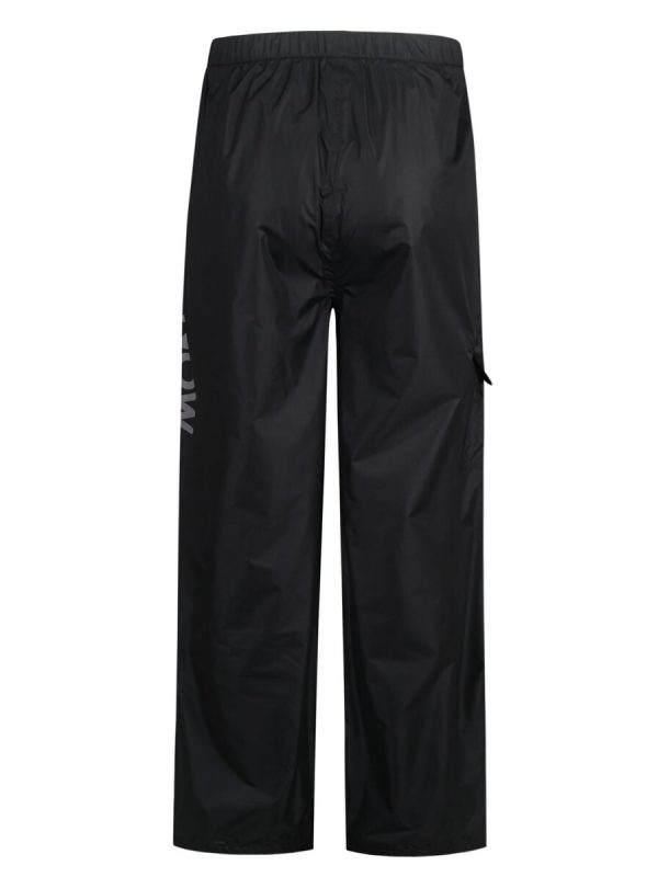 Water-resistant black work pants with elastic waistband, suitable for industrial and outdoor activities. Durable and comfortable for professional safety wear.