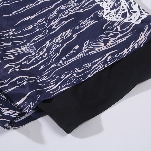 Blue and white custom printed fabric with dragon and wave patterns, ideal for creating unique clothing uniforms by a China-based manufacturer.