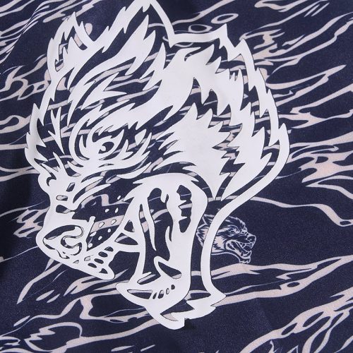 High-quality custom fabric with bold white dragon graphic print on navy background, ideal for workwear uniforms, showcasing craftsmanship and unique design for personalized clothing.