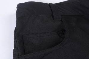 Durable black work bag with multiple compartments, designed for professionals to carry tools, gadgets, or personal items efficiently and securely for work environments.