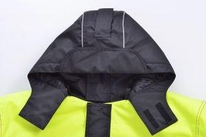 High-visibility yellow rain jacket with black waterproof hood and velcro wrist straps, ideal for outdoor work and safety compliance.