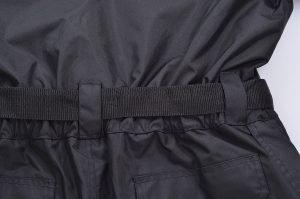 High-quality black workwear fabric with durable elastic waistband and reinforced stitching for industrial uniforms and custom work clothing manufacturing.