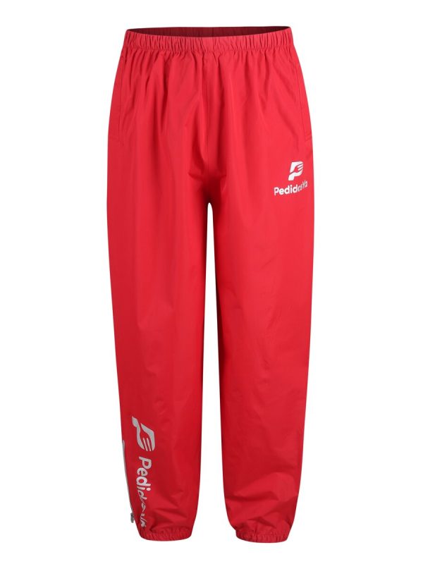 Bright red custom sports pants with elastic waistband and logo print, ideal for team uniforms or athletic wear, designed for durability and comfort.