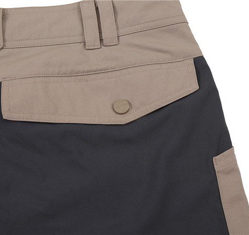 Durable custom work uniform pants with multiple pockets, tailored for comfort and practicality in manufacturing and industrial settings. Perfect for professional workwear needs.