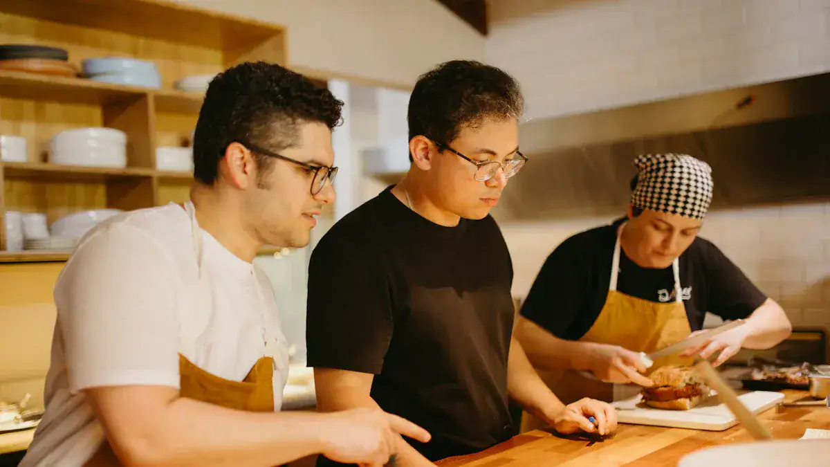 Custom clothing uniforms for chefs and kitchen staff at a professional restaurant. High-quality, customized workwear designed for comfort, durability, and style in culinary environments.