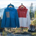 High-quality outdoor jackets with adjustable hoods, perfect for hiking and mountain adventures, showcasing durable materials and stylish design from a leading Chinese custom clothing manufacturer.