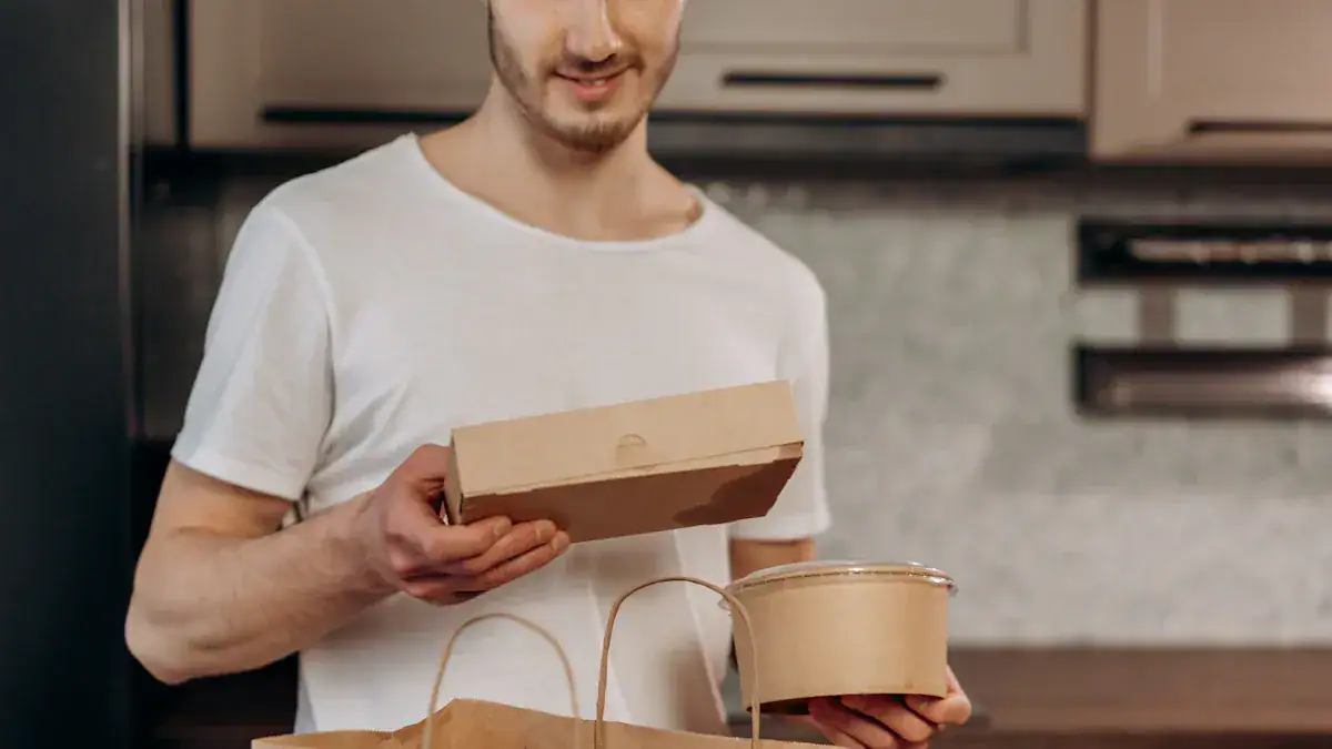 Eco-friendly food delivery packaging with cardboard boxes and bowls for sustainable meal service.