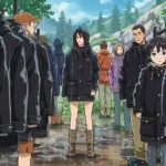 Rainproof black outdoor jackets displayed on mannequins in a rain forest setting.