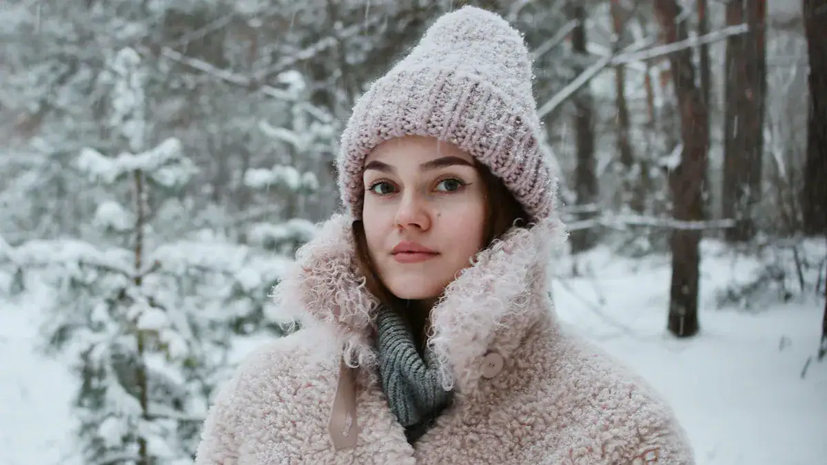 Warm winter woman in coat and knitted hat in snowy forest setting.