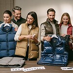 High-quality custom puffer vests and jackets displayed for clothing branding and uniform solutions at a wholesale manufacturer in China.