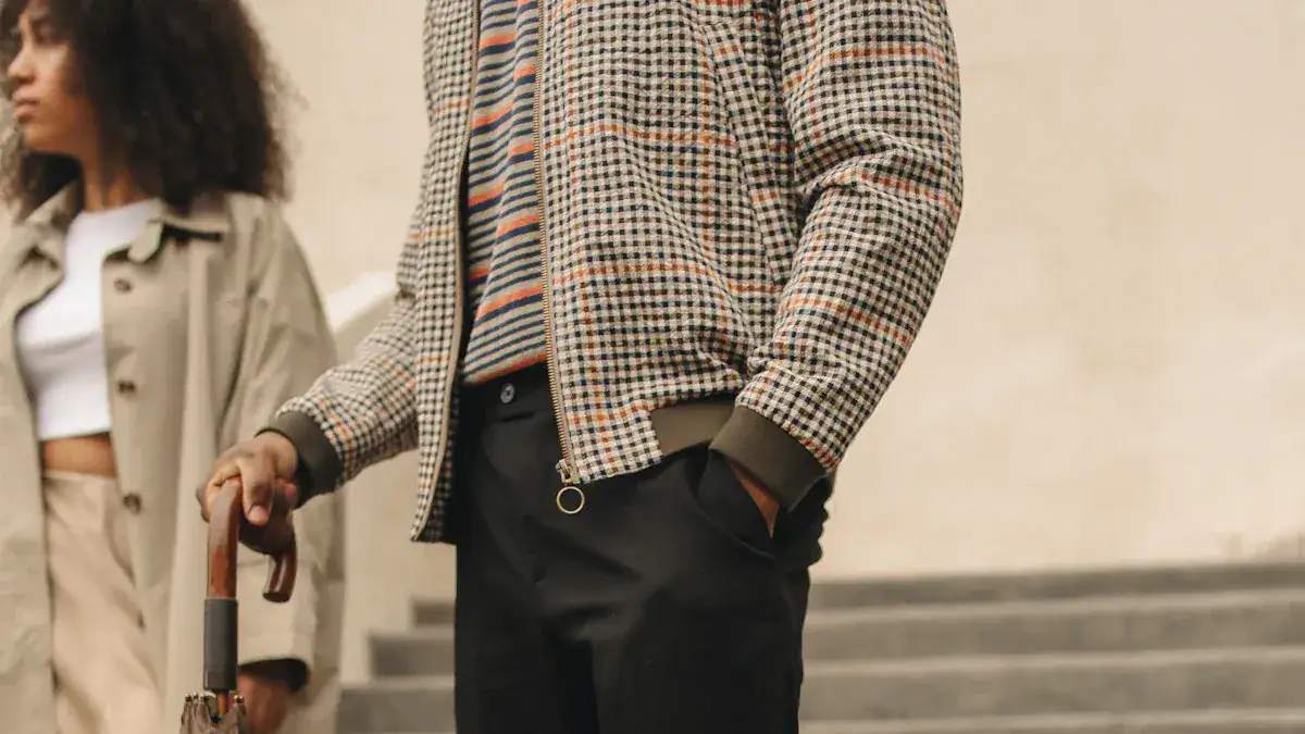 Rugged checkered jackets and casual clothing styles worn by diverse models in an urban setting, highlighting custom clothing and uniforms from China manufacturer Sha.