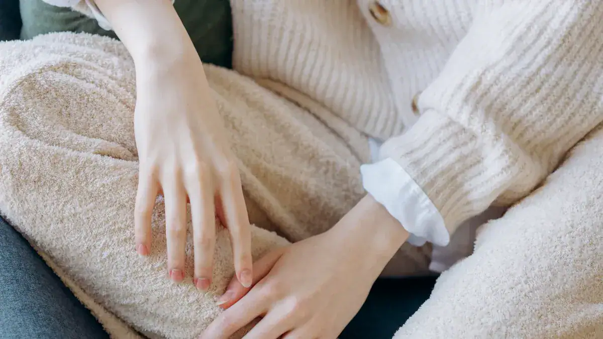 Soft beige fleece clothing with a cozy, textured finish, perfect for comfort and warmth.